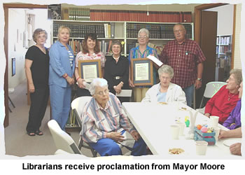 Librarians receive proclamation from Mayor Moore